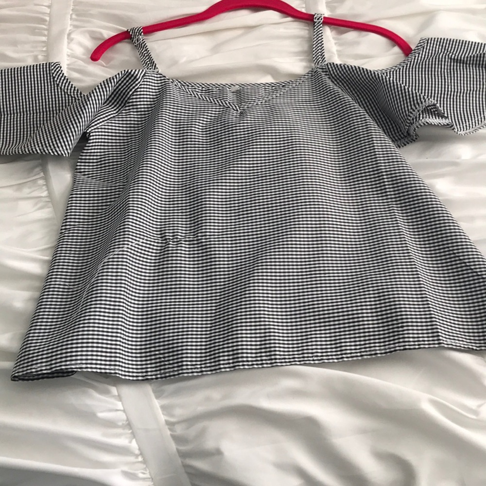 Black and one off shoulder sleeve shirt